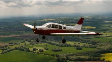 G-BTUW air to air over Enstone airfield